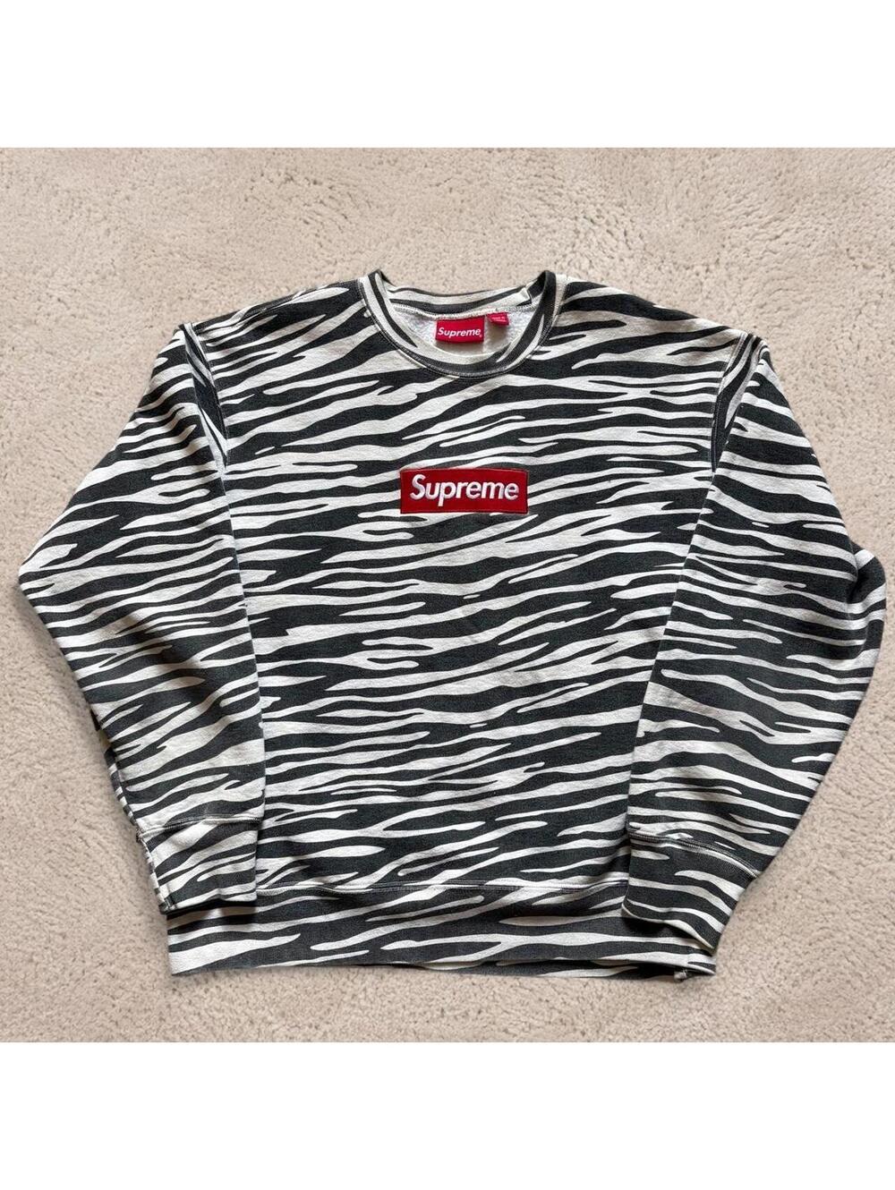 00 percent authentic supreme zebra bogo sweatshirt.